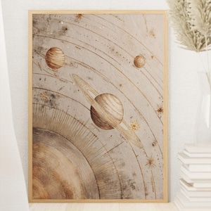 May include: A framed print depicting a vintage-style illustration of the solar system. The artwork features planets, orbits, and celestial bodies in shades of brown and beige, with a wooden frame.