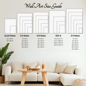 Puede incluir: Una gu&iacute;a de tama&ntilde;os de arte mural con varias relaciones de aspecto y dimensiones en cent&iacute;metros. La gu&iacute;a incluye las proporciones 11:14, 3:4, 4:5, ISO A y 2:3, con tama&ntilde;os como 28 x 35.5 cm y 61 x 91.5 cm. El texto "Wall Art Size Guide" est&aacute; en la parte superior.