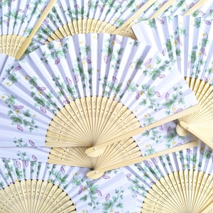 kleurrijke print op papier handfans, huwelijksgeschenken, feestartikelen, promotiegeschenk, jubileumgeschenken met ontwerp, logo, foto, bulk. groothandelsprijs