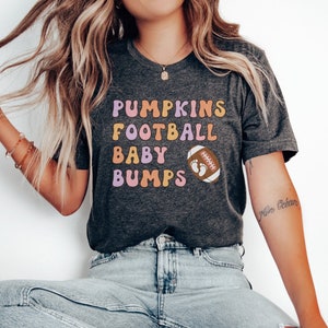 Football baby bumps pregnancy Announcement shirt, Pregnancy reveal t-shirt, Fall Baby reveal tee, Fall Maternity tshirt, Thanksgiving baby