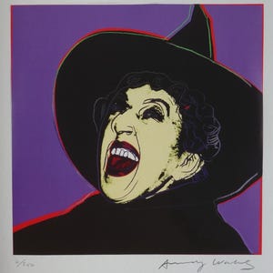 May include: A colorful screen print of a woman wearing a black witch's hat and a black dress. The woman is laughing with her mouth open and her teeth showing. The background is purple. The print is signed "Andy Warhol" and numbered "9/250".
