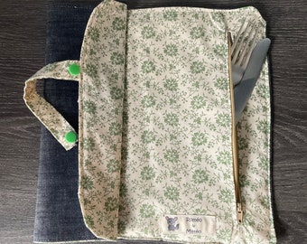 Large placemat with zippered pocket and snap fastener