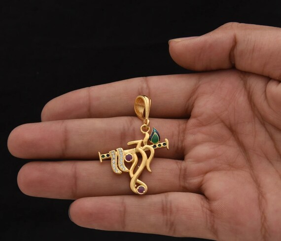 Krishna flute gold pendant deals
