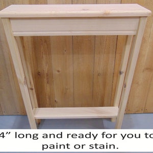 May include: A 24-inch long unfinished wooden console table with a shelf and a planter box. The table is ready to be painted or stained.