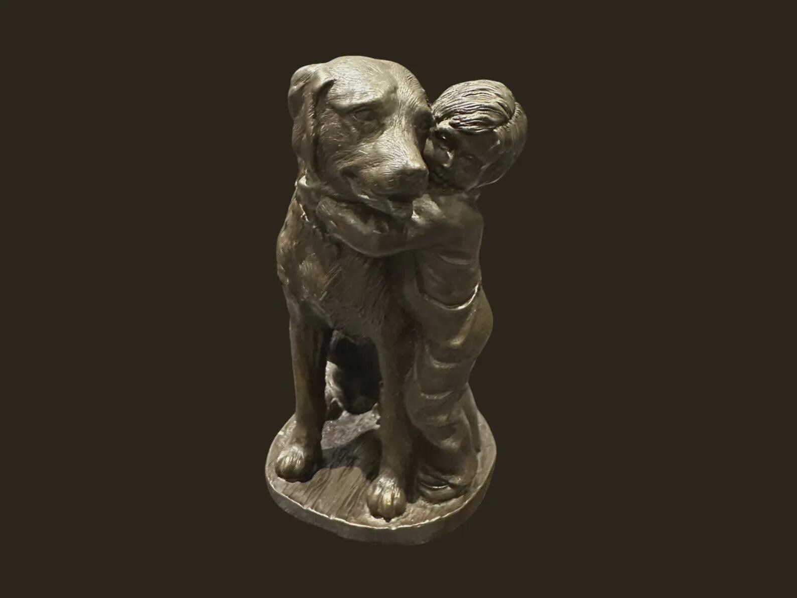 ヴィンテージ・ヘレディティーズ社製ブロンズ彫刻「犬を抱きしめる少年