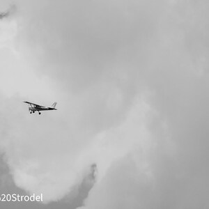 Plane and Clouds