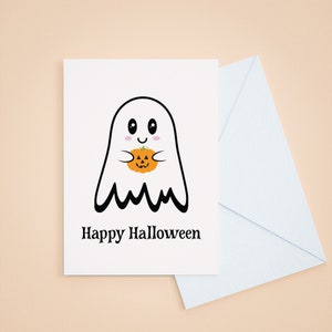 May include: A white ghost with a friendly face holds a jack-o'-lantern pumpkin. The text "Happy Halloween" is below the ghost.