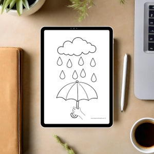 K&ouml;nnte beinhalten: Ein digitales Tablet zeigt eine Schwarz-Wei&szlig;-Illustration einer Wolke, Regentropfen und eines Regenschirms. Eine Hand h&auml;lt den Regenschirm. Ein wei&szlig;er Stift, eine Tasse Kaffee und ein Laptop liegen auf dem Tisch.
