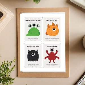 May include: Four colorful cards with cartoon monsters and text describing their personality traits. The cards are titled "Ms Mind Reader", "The Psychic", "Scaredy Bat", and "Mustodon".