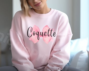 Sudadera Coquette con estampado de lazo rosa y cuello redondo acogedor