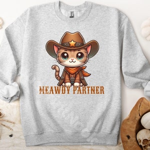 Meady Partner Cowboy Cat Halloween Sweatshirt, Gift for Cat Owners, Cowboy Shirt Cat Halloween Shirt Funny Cowboy Cat Sweatshirt Crewneck