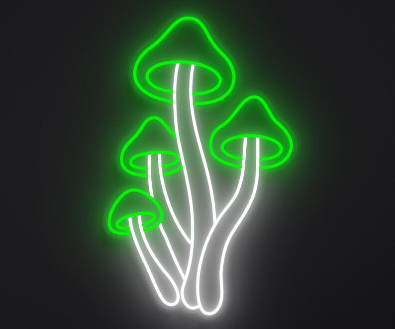 Magical mushrooms neon sign in green and white.