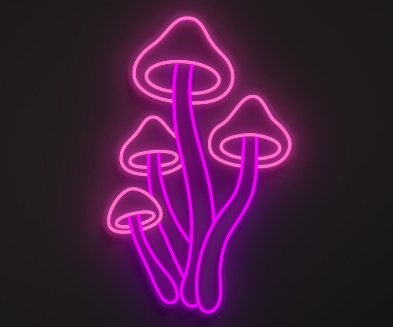 Magical mushrooms neon sign in light pink and hot pink.