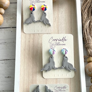 Seal with Beach Ball on It&#39;s Nose Dangle Polymer Clay Earrings