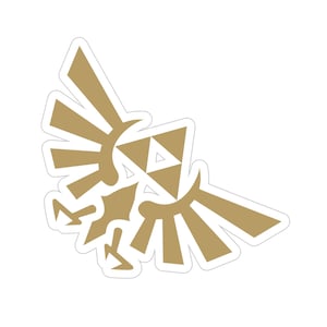 Peut inclure: Une image stylisée dorée d'un oiseau aux ailes déployées, avec un motif triangulaire au centre. L'image est un symbole populaire de la série de jeux vidéo The Legend of Zelda.