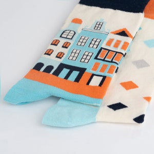 Collection of long socks for women, tall socks, and dress socks for both men and women. The range includes both aesthetic and funny socks for unique styles