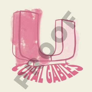 Pu&ograve; includere: Illustrazione ad acquerello rosa della lettera U con le parole "Coral Gables" sotto.