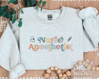 Nurse Anesthetist Pastel Crewneck Sweatshirt. CRNA Sweatshirt. CRNA Shirts. Certified Registered Nurse Anesthetist. CRNA Grad Gifts.