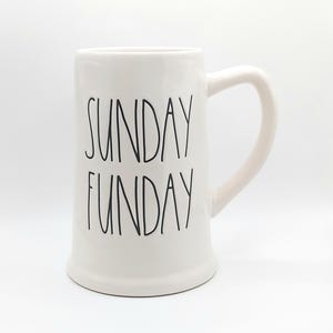 May include: White ceramic mug with black lettering that reads "SUNDAY FUNDAY".