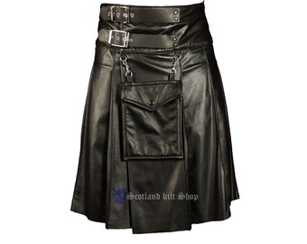 May include: Black leather kilt with a large front pocket and a double buckle belt. The kilt has pleats and is made of genuine leather. The text "Scotland kilt Shop" is visible on the bottom of the kilt.