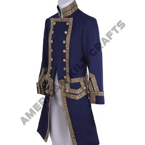 May include: A navy blue coat with gold trim and buttons. The coat has a high collar and a long, flowing tail. The coat is decorated with intricate gold embroidery.