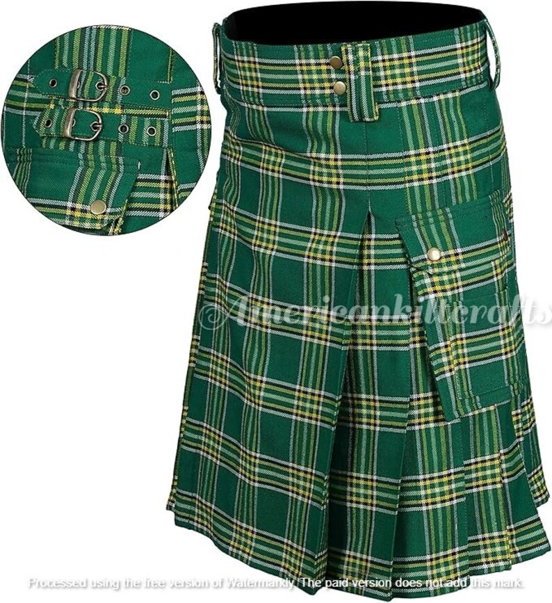 May include: A green, yellow, and white plaid kilt with a large cargo pocket on the right side. The kilt has a buckle closure and is made of a woven fabric.