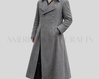 May include: A long, gray coat with a double-breasted design. The coat features large lapels, multiple buttons, and pockets. The coat is a classic style, suitable for formal occasions. The text "AMERICAN CRAFTS" is visible in the image.