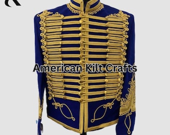 May include: A blue military-style jacket with gold-colored trim and buttons. The jacket features a high collar and intricate gold embroidery along the front and sleeves. The text "American Kilt Crafts" is visible on the front of the jacket.