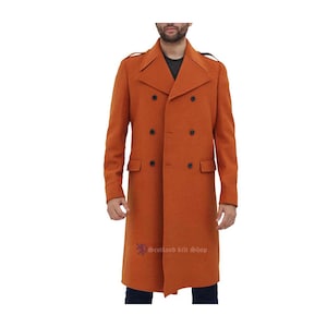 May include: A long, double-breasted coat in a burnt orange color. The coat has a notched collar, flap pockets, and a single button at the wrist.