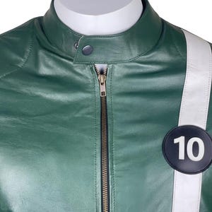 May include: A green leather jacket with a white stripe and a black circle with the number 10 on it.