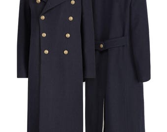 May include: A long, dark blue double-breasted coat with gold buttons. The coat has a high collar and a single vent in the back.
