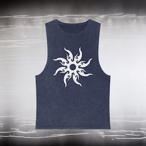 May include: A navy blue sleeveless shirt with a white stylised sun design.