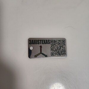 Laser annealed custom key tag