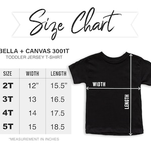 May include: Black toddler jersey t-shirt with a size chart. The chart shows measurements for sizes 2T to 5T, with width and length in inches. The text "Size Chart" is at the top. The shirt is from Bella + Canvas.