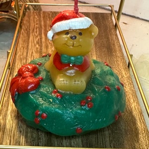 Avon Christmas Teddy Bear Candle Teddy sitting on a Wreath Red Ribbon Vintage