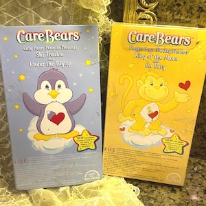 Vintage Pair Of NOS Carebears Sealed VHS Cassettes