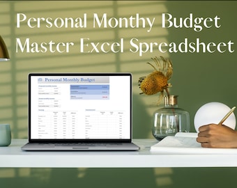 May include: A laptop displaying a "Personal Monthly Budget" Excel spreadsheet sits on a white desk. The text "Personal Monthly Budget Master Excel Spreadsheet" is above the laptop. A gold lamp, a small green vase, and decorative items are also on the desk.