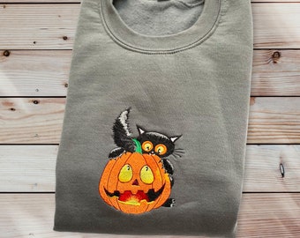Halloween Embroidered Crewneck Sweatshirt featuring a Pumpkin with Cat design. Great for the fall Spooky Season Perfect Gift for Cat Lover