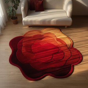 Rose-shaped rug in red, orange, and burgundy tones in a sunlit modern living room.