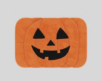 ジャック・オー・ランタンのパンプキンラグ：ハロウィンオレンジの不気味なアクセント