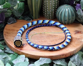 Paracord customizable snakewhip with a coin