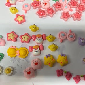Adornos magnéticos de Kitty y Mario