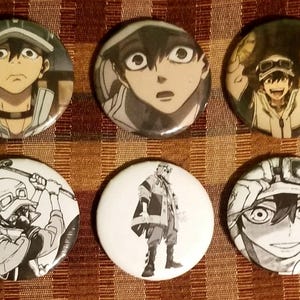 May include: Six round anime-style buttons with different character illustrations. The buttons feature various characters with different expressions and poses, some in color and some in black and white.