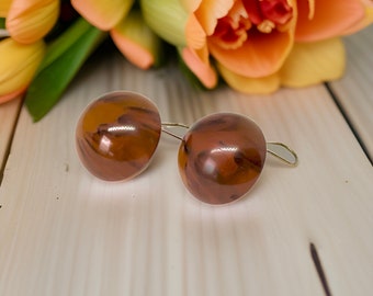 Vintage marbled amber coloured domed bakelite clip on earrings with gold fittings, round vintage earrings