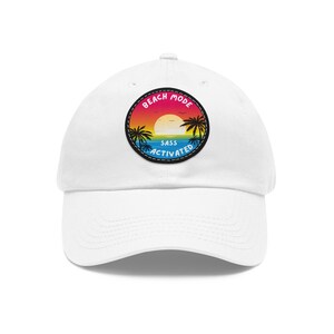 May include: White baseball cap with a colorful patch that says "Beach Mode Sass Activated" with a sunset and palm trees.