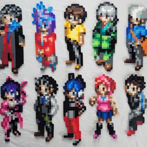 May include: Ten pixel art figures of anime characters, each with a unique design and color scheme. The figures are made of small beads and are arranged in two rows of five.