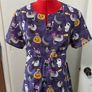 Halloween Maternity Scrub Top for Women with split v-neck, hidden pockets and back ties.