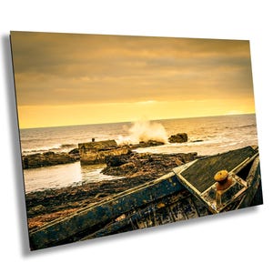 Rustic Old Harbour with Waves Crashing Against a Weathered Boat and Wall, Coastal Scene at Auchmithie, Angus, Scotland Photo Art Home Decor.