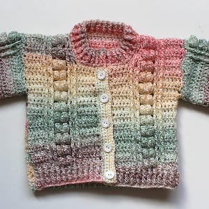 Handmade multicoloured pastel stripe knitted baby cardigan with bobble detailing | gender neutral | 6-12 months | Anni & Amie