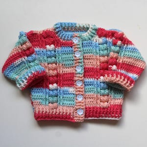 Handmade multicoloured stripe knitted baby cardigan with bobble detailing | gender neutral | 6-12 months | Anni & Amie